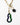 a close up of Katerina Psoma Plume necklace — Murano glass wave pendant and blue goldstone bead on a gold paperclip chain