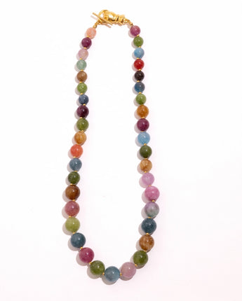 Katerina Psoma Noni necklace — multicolor nephrite beads with a hammered gold toggle clasp