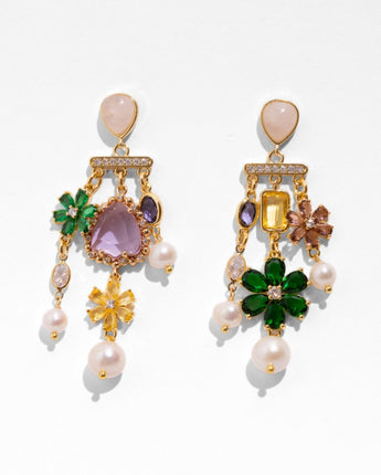 Katerina Psoma Primavera earrings — crystal flowers, faceted stones and pearls dangling from a pavé gold bar