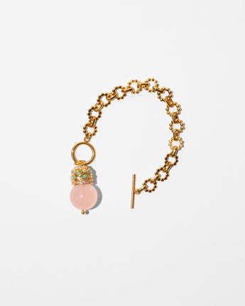 Katerina Psoma Cupola bracelet — rose quartz bead set on a gold plated chain with turquoise and crystal gold-plated dome