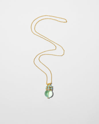 Katerina Psoma Cupola necklace with gold plated chain featuring a fluorite bead set on a gold plated metal dome adorned with turquoise