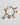 Katerina Psoma Gold bracelet with various charms, ceramic beads