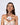 a model wearing Katerina Psoma Short gold plated metal necklace with one big Murano glass flower in white colors