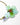 Close up detail of a Katerina Psoma Short gold plated metal necklace with one big Murano glass flower in light green colors
