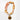 Katerina Psoma Necklace with orange and pink links and a gold shell charm