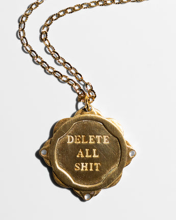 Katerina Psoma gold plated short chain necklace with a charm delete all shit