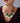 Katerina Psoma short necklace with flowers and green beaded leaves