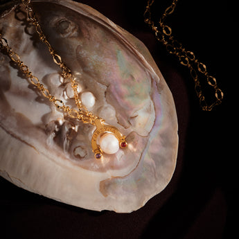 Katerina Psoma Godd Luck charm 2025 with white pearl