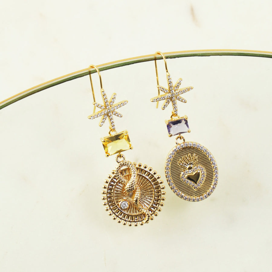 Katerina Psoma Unmatched pair of earrings with charms and crystals