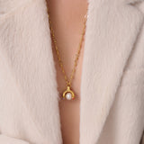 Katerina Psoma Godd Luck charm 2025 with white pearl