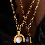 Katerina Psoma Godd Luck charm 2025 with grey pearl and gold plated chain