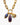 Detail of Katerina Psoma Lucilla necklace — labradorite, amethyst and agate charms with a green crystal accent, on a gold paperclip chain