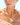 Katerina Psoma Necklace with orange and pink links and a gold shell pendant 