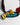 Katerina Psoma  Colorful short necklace with beads and a gold bow 