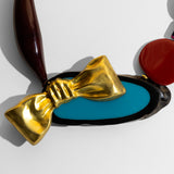 Katerina Psoma  Colorful short necklace with beads and a gold bow 