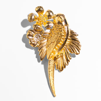 Gold plated metal parrot brooch