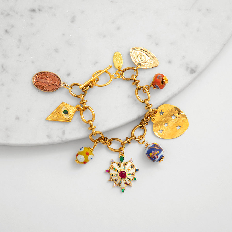 katerina psoma charm bracelet with trade beads and enamel