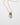 Detail of Katerina Psoma Cupola pendant chain necklace with a polished rose quartz and gold plated metal dome adorned with stones