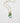 detail of Katerina Psoma Cupola necklace with gold plated chain featuring a fluorite bead set on a gold plated metal dome adorned with turquoise