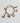 Katerina Psoma Gold bracelet with various charms, ceramic beads