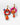 Colorful hoop earrings with orange beads on a light gray background