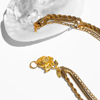 katerina psoma gold plated 3 row necklace with a metal rose clasp