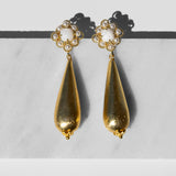 Katerina Psoma with gold plated drops