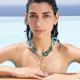Katerina Psoma Necklace with green and turquoise rope links and a gold starfish charm 