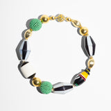 Katerina Psoma necklaca with goldplated beads, black and white and green beads
