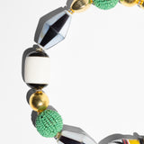 Katerina Psoma necklaca with goldplated beads, black and white and green beads