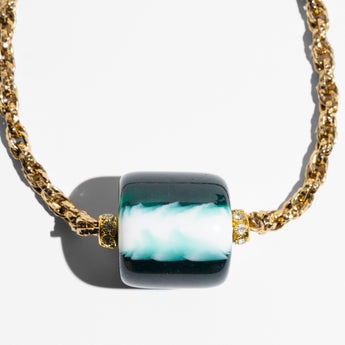 Katerina Psoma Short necklace with gold chain and a central green and white marbled bead 