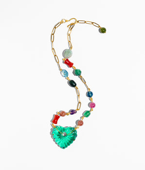 Necklace with colorful beads and a green heart-shaped pendant 