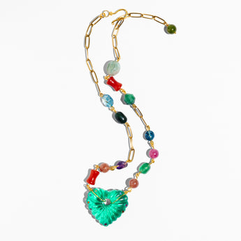 Necklace with colorful beads and a green heart-shaped pendant 