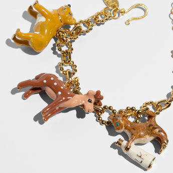 Gold charm bracelet with animal charms