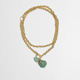 Katerina Psoma chain necklace with green agate bottle worn short or long