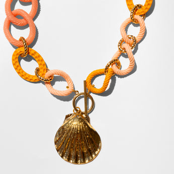 Katerina Psoma Necklace with orange and pink links and a gold shell pendant 
