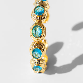 Katerina Psoma gold plated metal bracelet with blue crystals