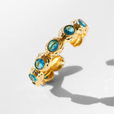 Katerina Psoma gold plated metal bracelet with blue crystals