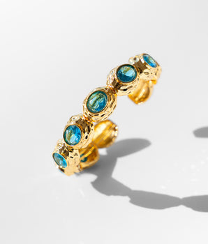 Katerina Psoma gold plated metal bracelet with blue crystals