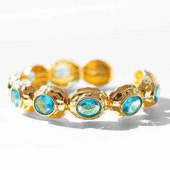 Katerina Psoma gold plated metal bracelet with blue crystals