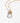 Detail of Katerina Psoma Cupola pendant chain necklace with a carved crystal quartz and gold plated metal dome adorned with turquoise
