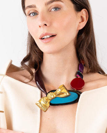 Katerina Psoma  Colorful short necklace with beads and a gold bow 
