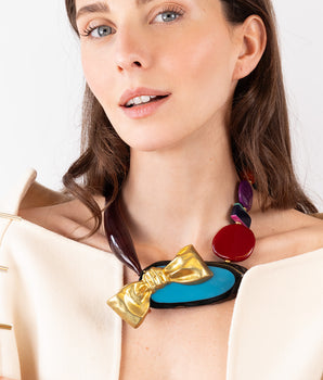 Katerina Psoma  Colorful short necklace with beads and a gold bow 