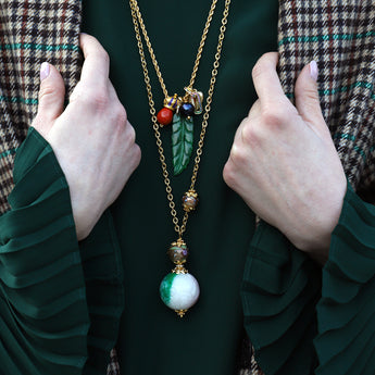 PENDANT WITH CARVED JADE